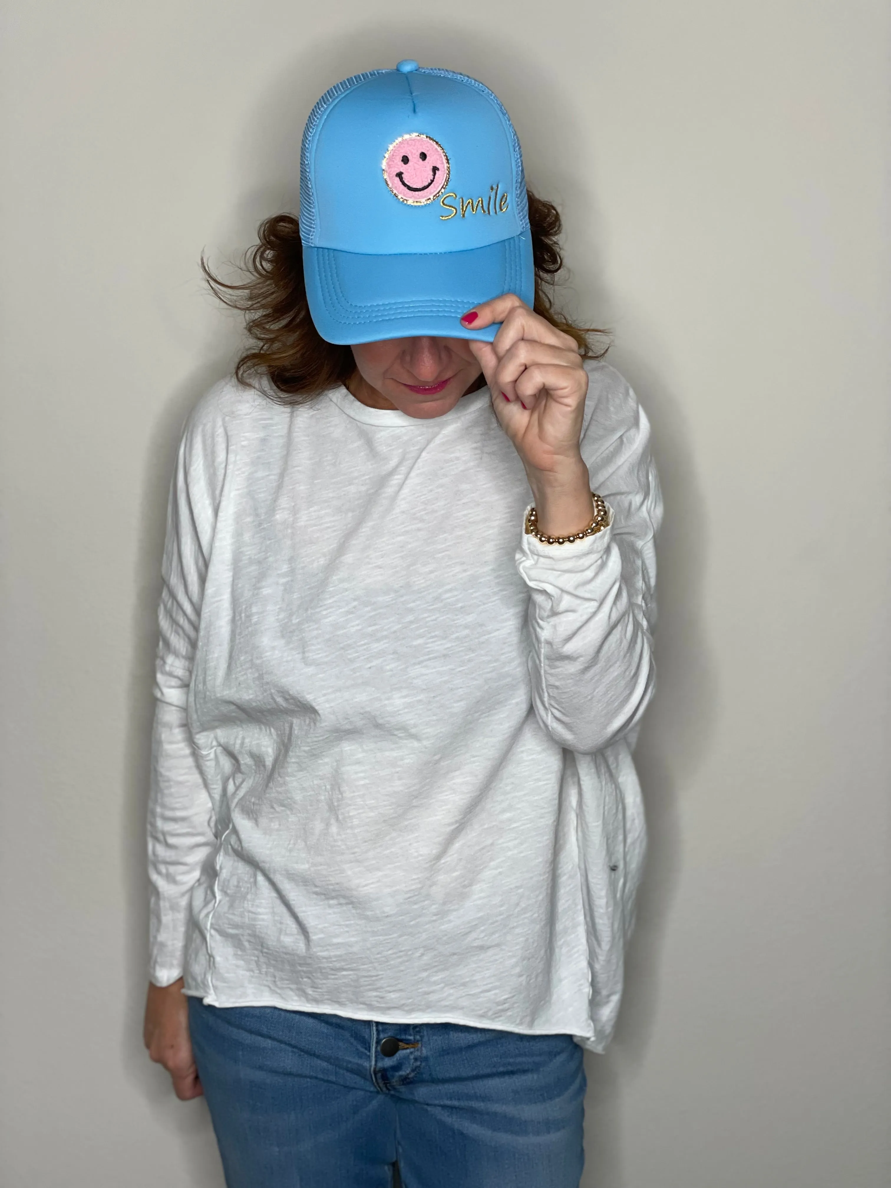 Caryn Lawn Smile Trucker Hat